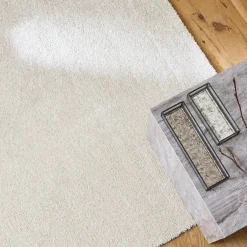 Crèmekleurig interieurtapijt in velours