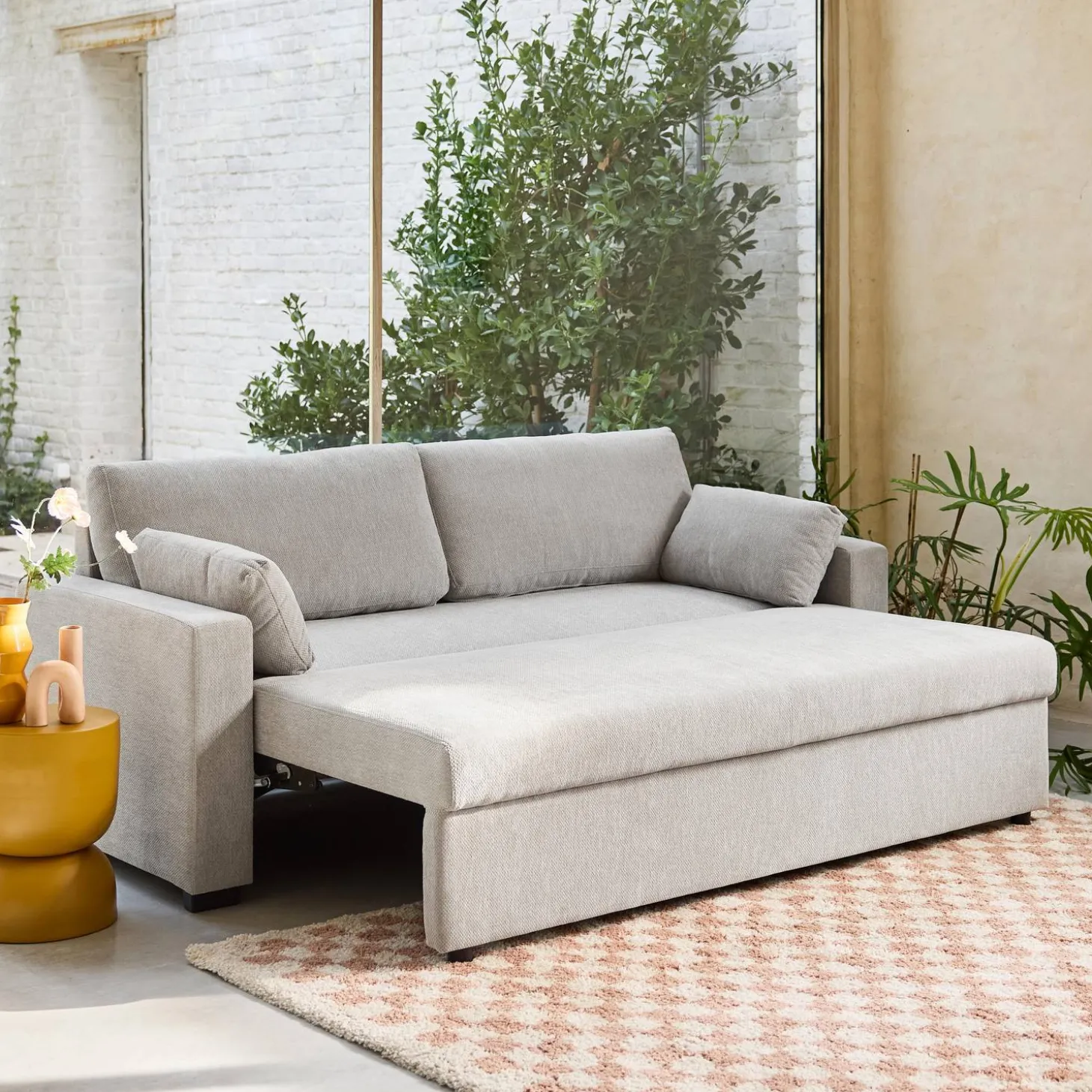 Driezits slaapbank in chenille stof
