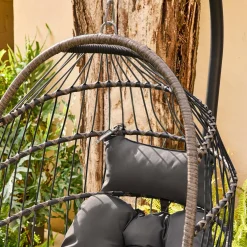 Hangend ei van staal, rotan, polyester