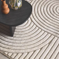 Interieur vloerkleed met bogen crème en beige