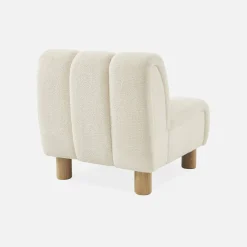 Relaxfauteuil met afgeronde poten in hout en boucléstof