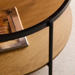 Ronde salontafel met dubbel blad en een materiaalmix