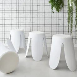 Set van 4 stapelkrukken in boucléstof