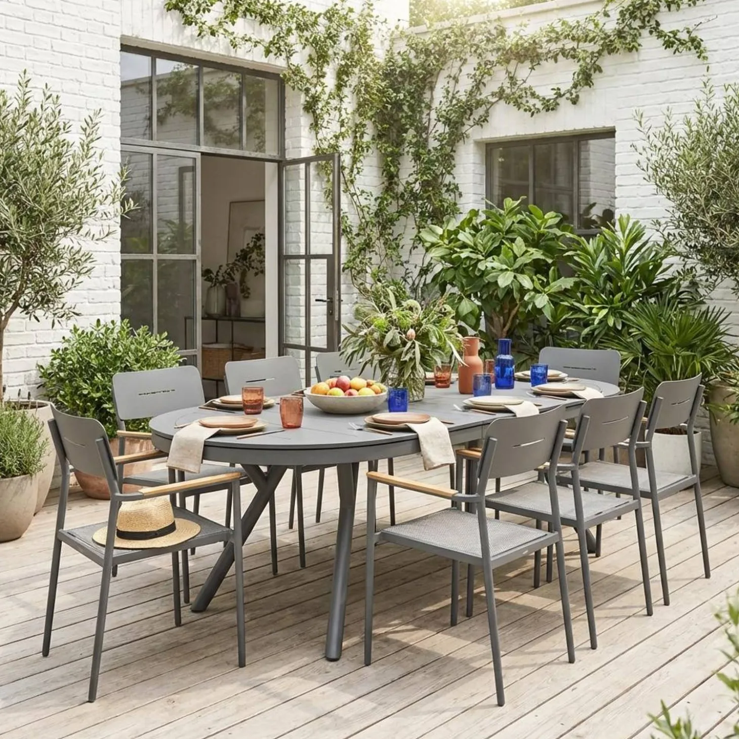Uitschuifbare ovale tuintafel van aluminium en 8 stoelen
