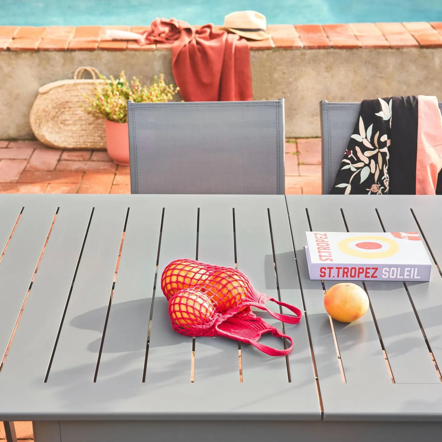 Uitschuifbare tuintafel van aluminium en textileen, 8 stoelen