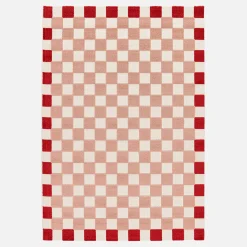 Vloerkleed voor binnen en buiten met rood en roze dambord patroon