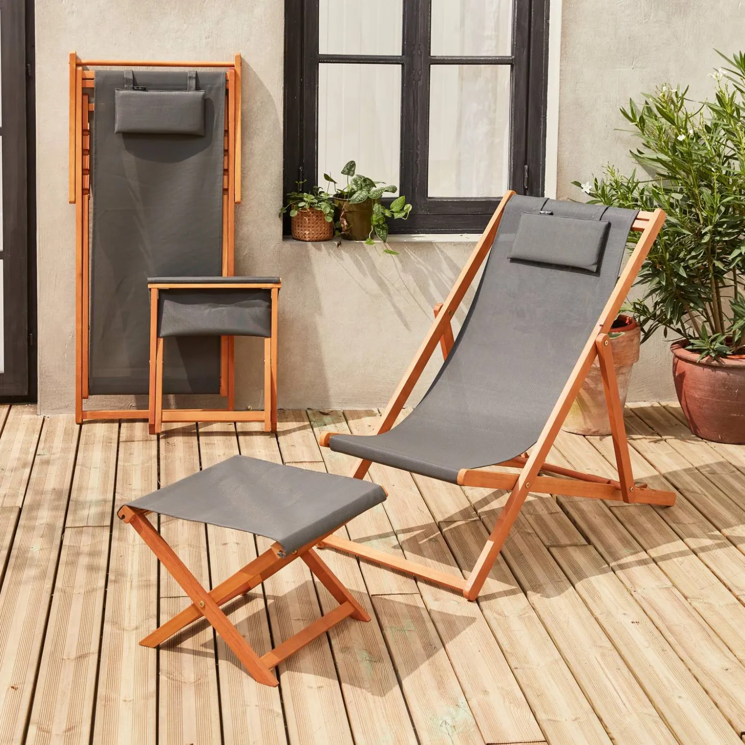 2x houten strandstoelen met voetenbank
