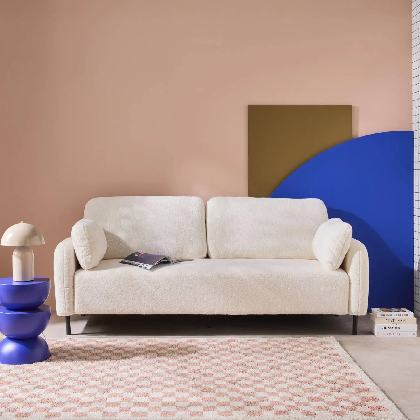 3-zits bank in wit bouclé en metalen onderstel
